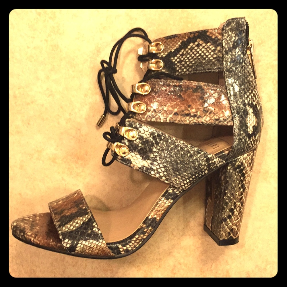 Lace up “skin” heels. 3.5 inch heel. Size 7